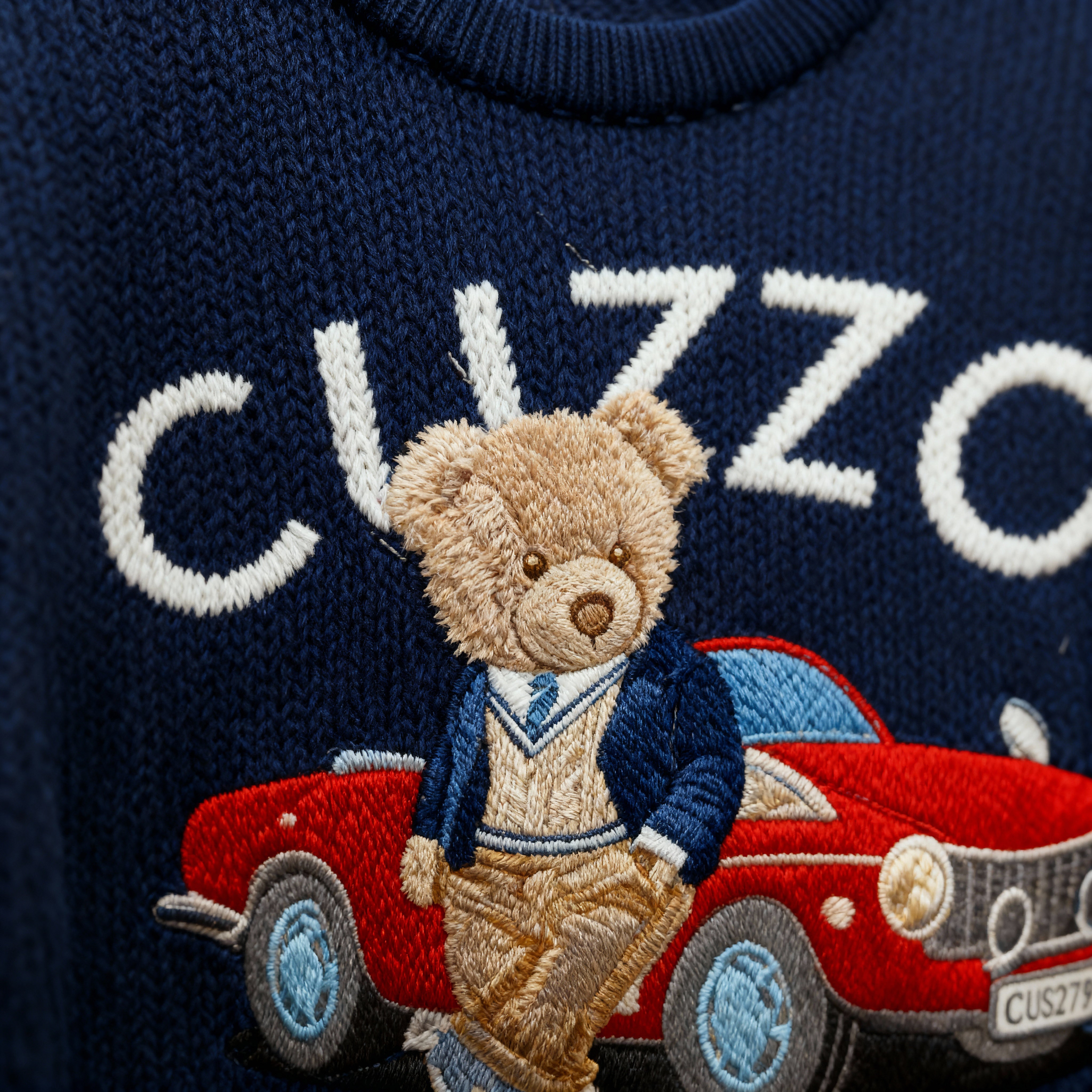 Cuzzy® Embroidered Knitted Sweater